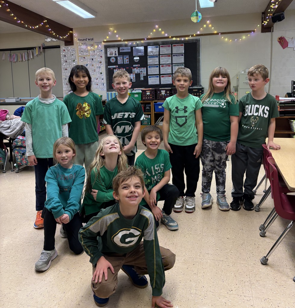 2nd grade students dressed in class color -green
