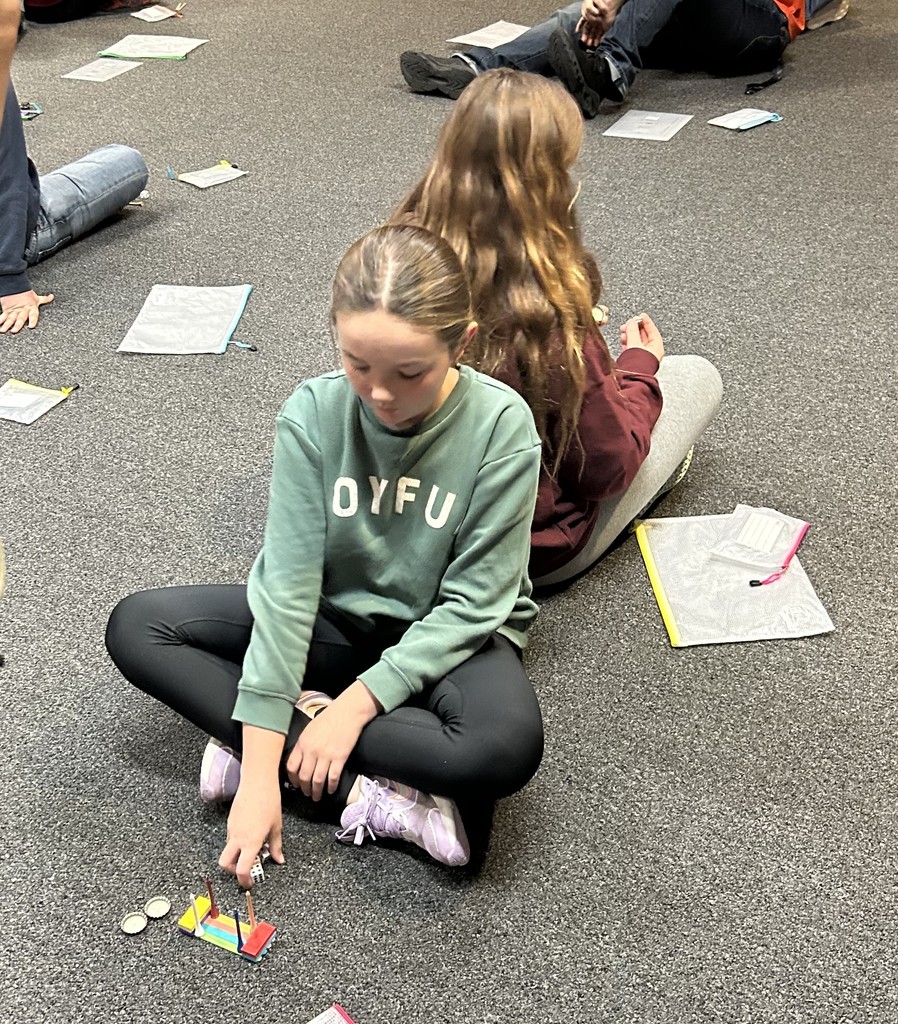 students do a team building game at the leadership conference