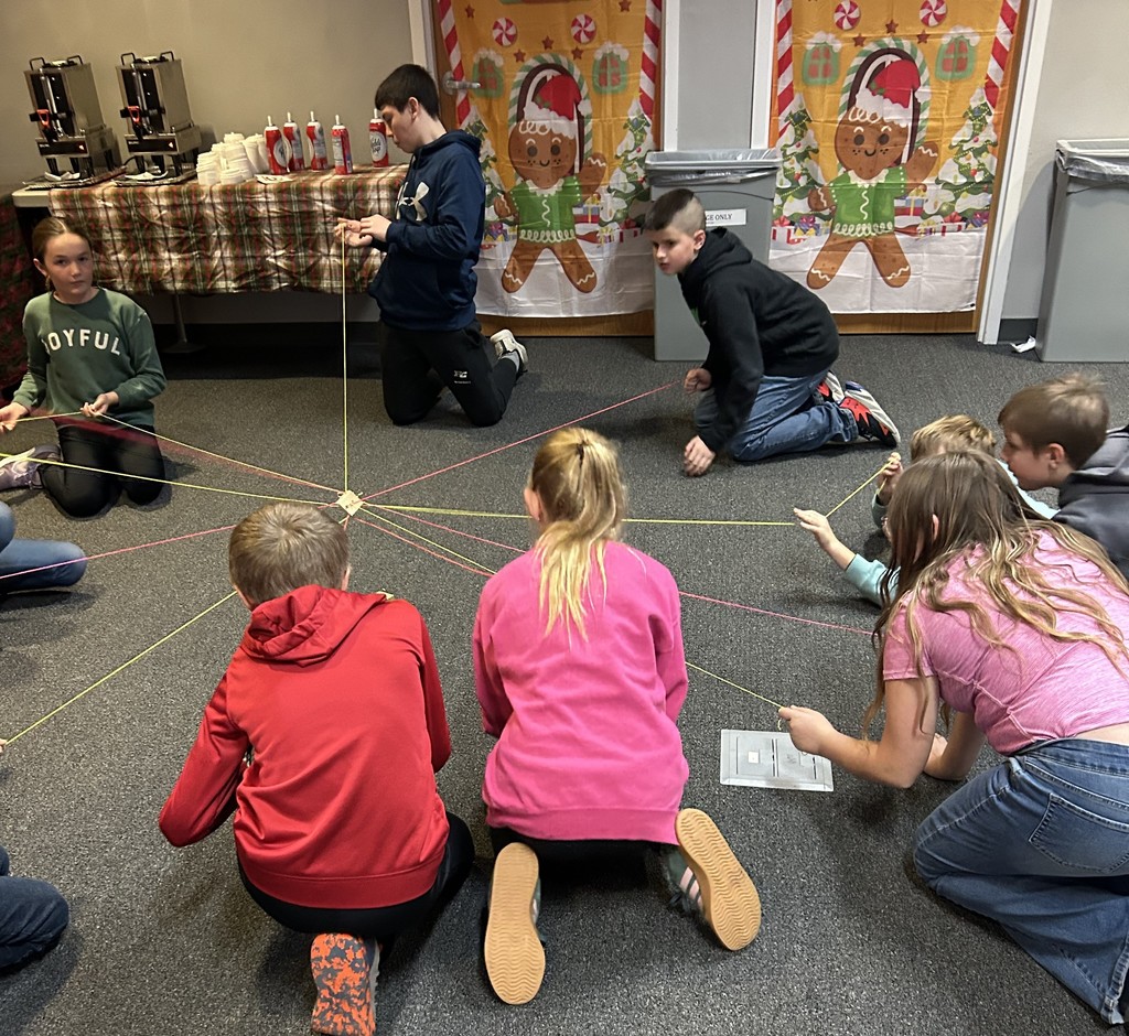 students do a team building game at the leadership conference