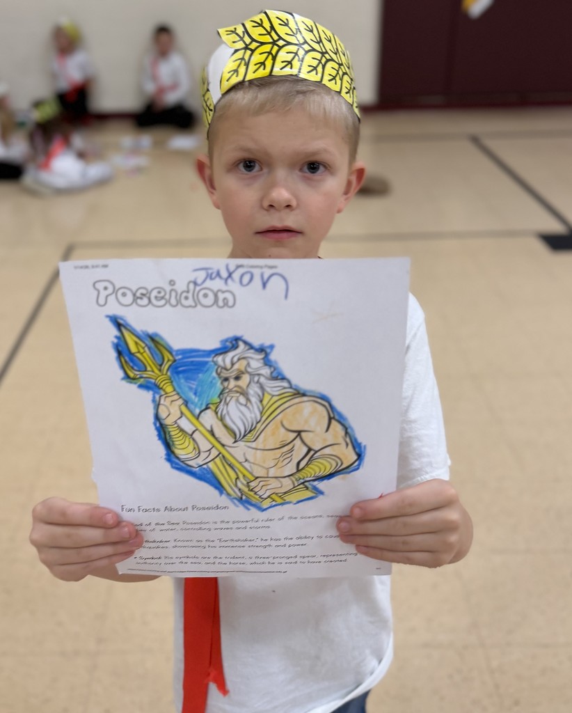 a students holds up a poseidon sign