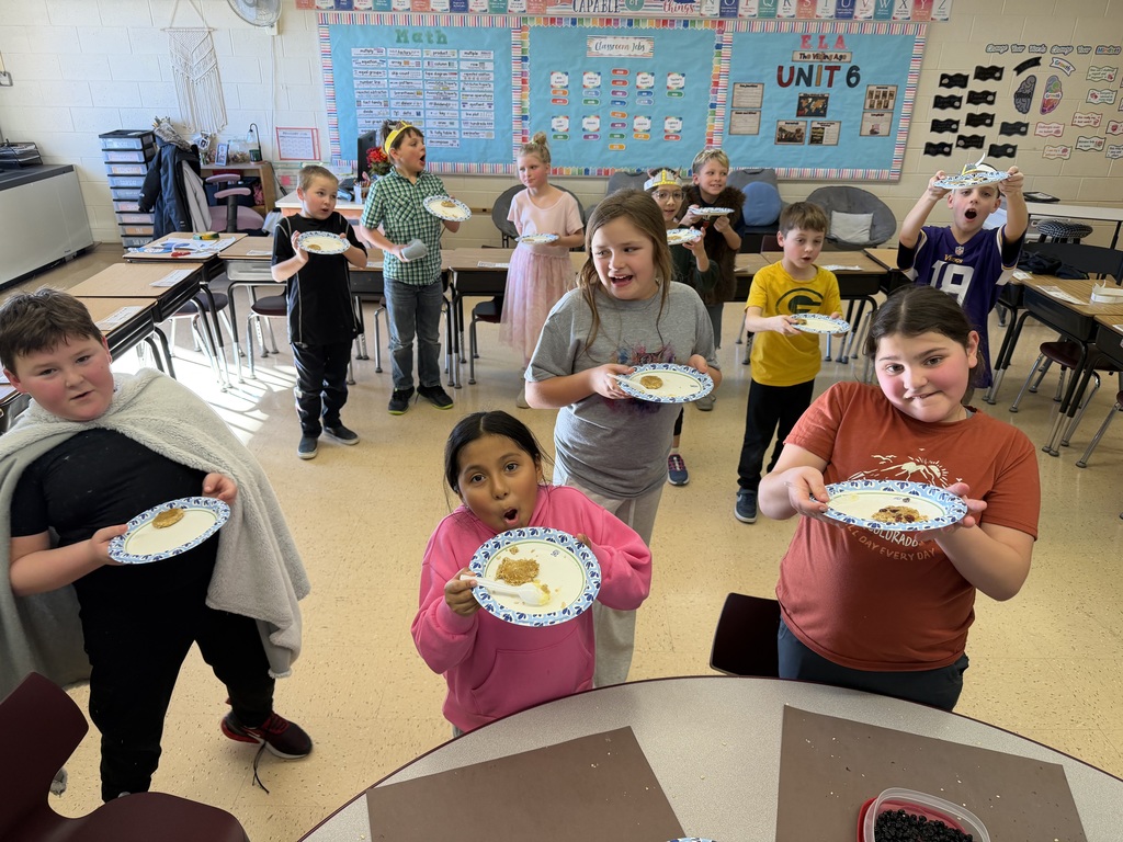 students have their viking cakes on a plate ready to eat