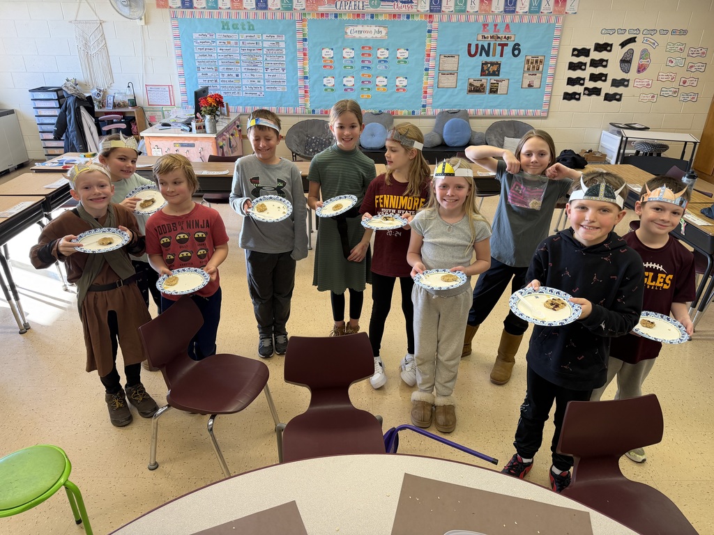 students have their viking cakes on a plate ready to eat