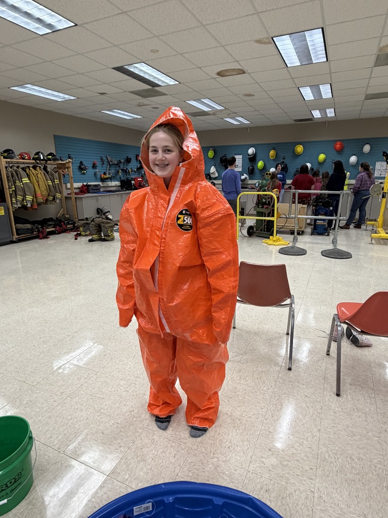 a seventh grade girl participates  at the women in STEM day at UWP 