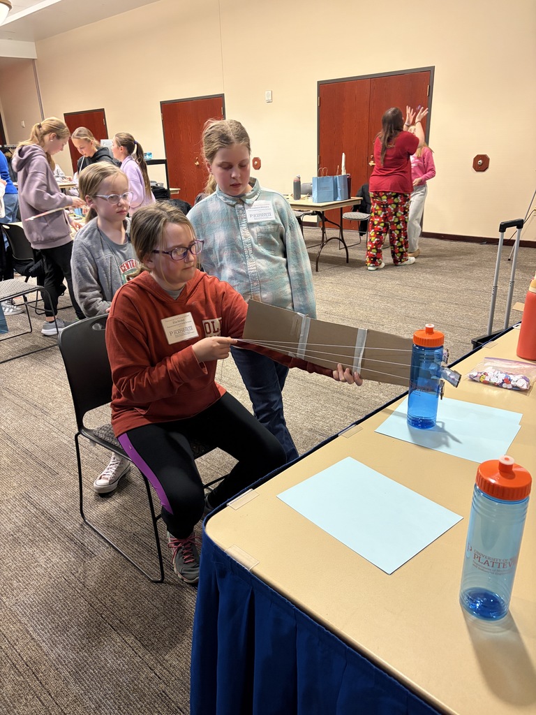 fifth and 7th grade girls at the women in STEM day at UWP doing an activity