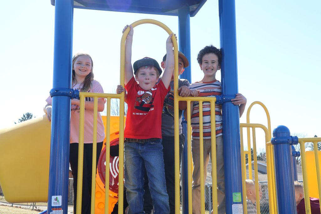 students play on the playground for extra PBIS reward recess