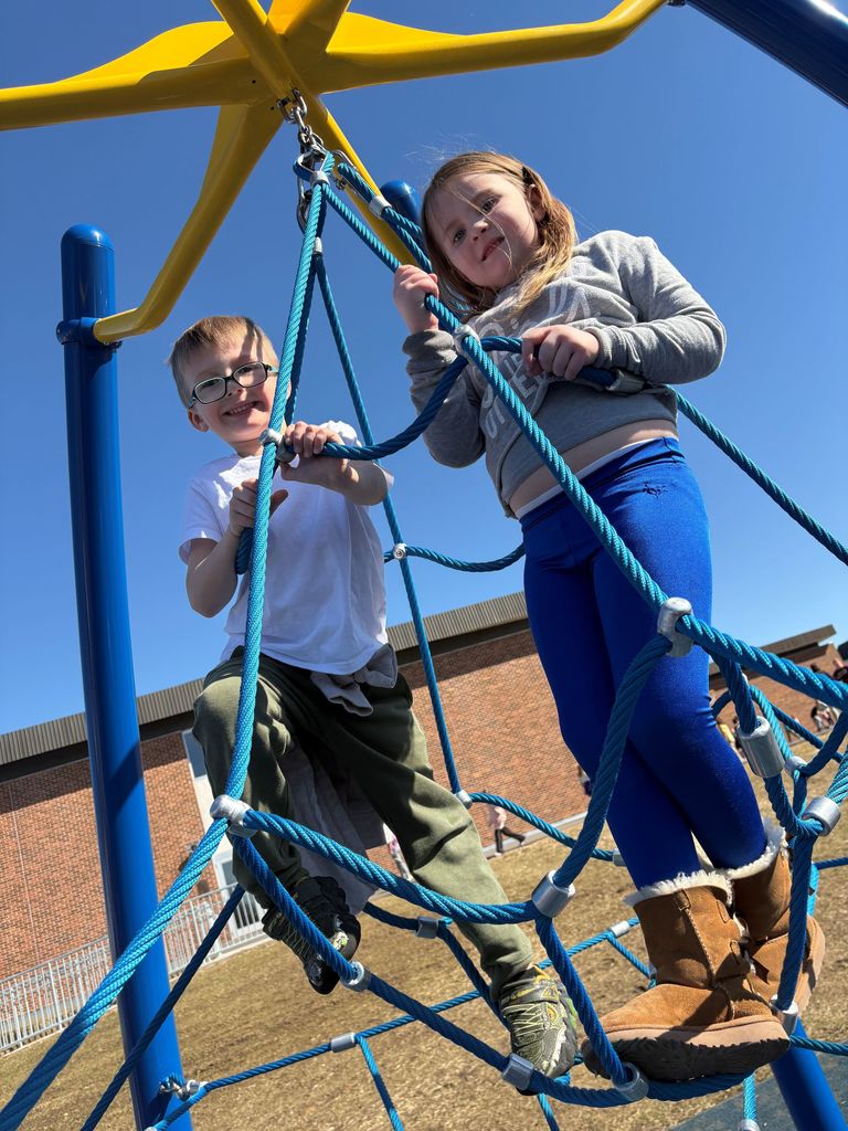 students play on the playground for extra PBIS reward recess