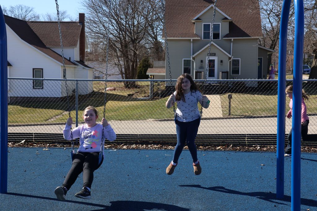 students play on the playground for extra PBIS reward recess