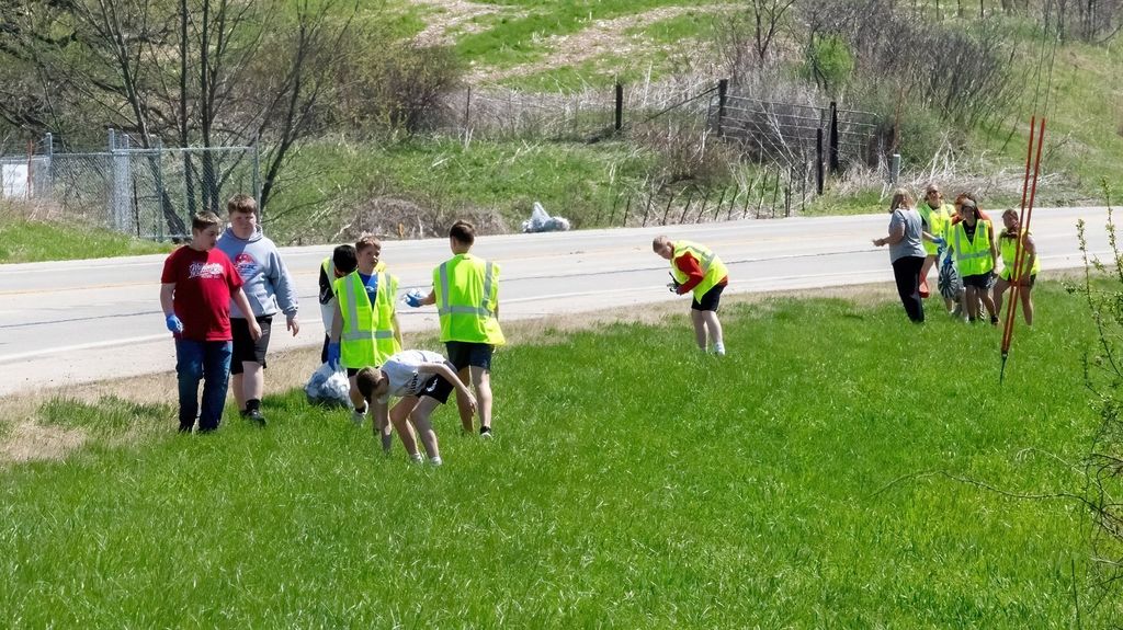 students do a road side pick up for earth day