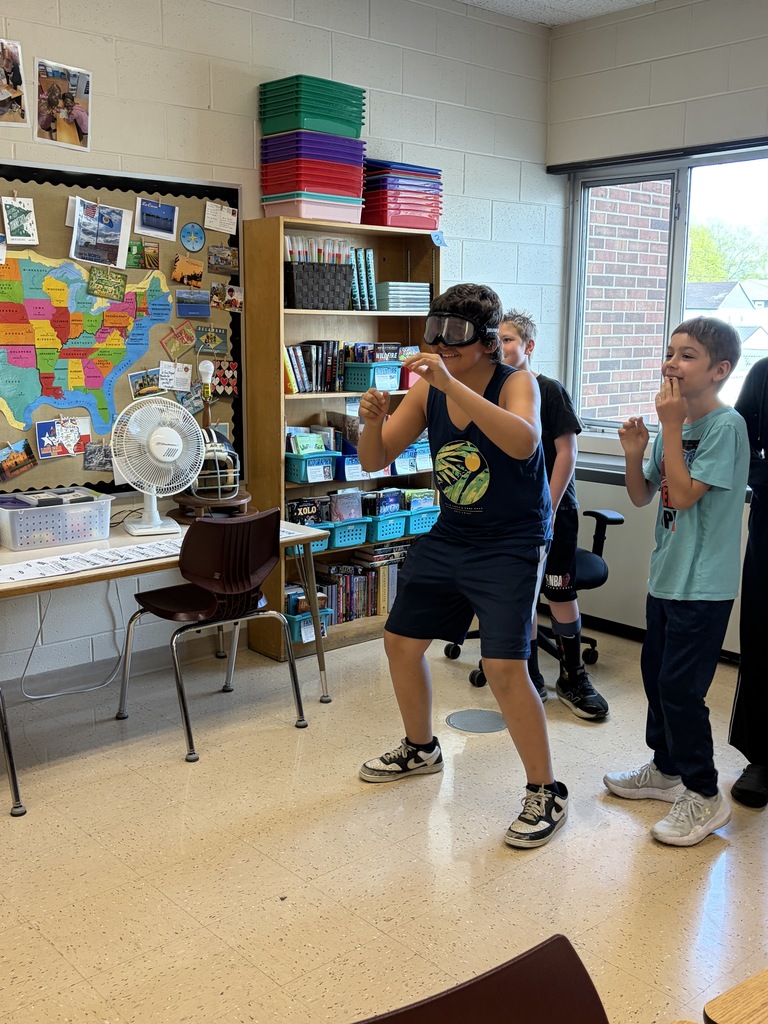 students try to catch a ball wearing the beer goggles