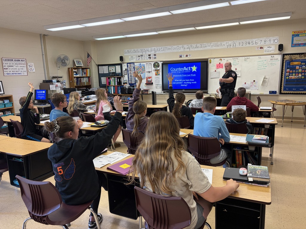 students listen to officer Fecht during a counteract lesson
