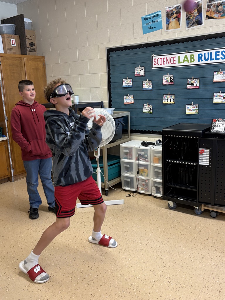 students try to catch a ball wearing the beer goggles