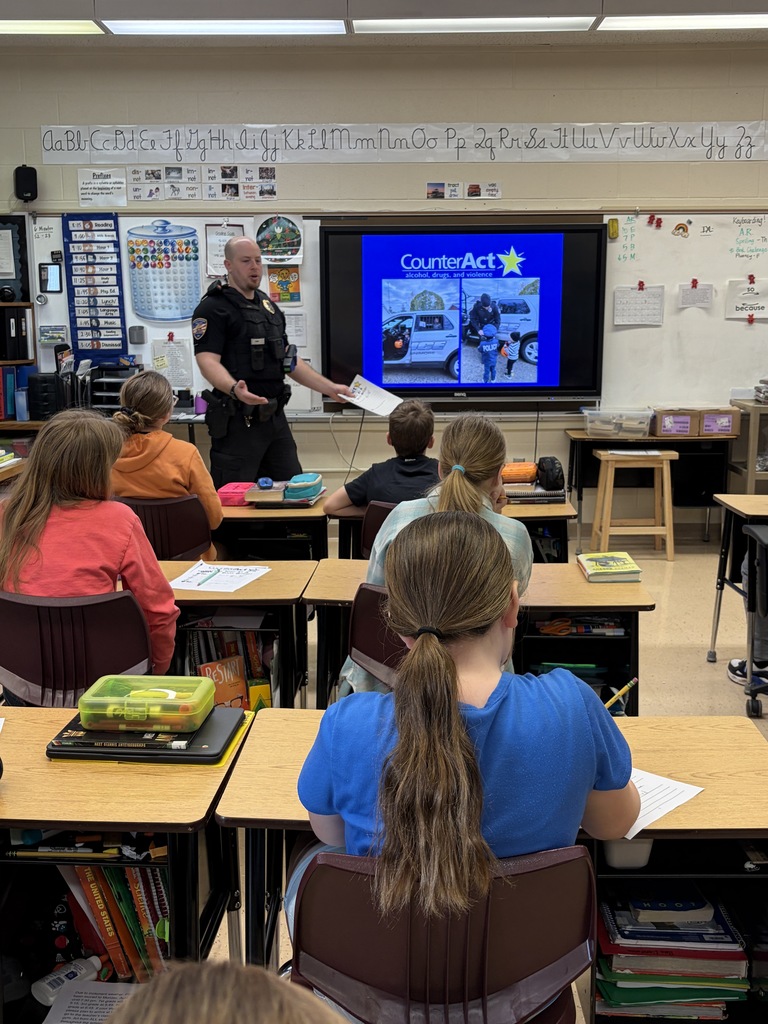 students listen to officer Fecht during a counteract lesson