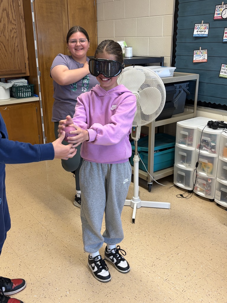 students try to catch a ball wearing the beer goggles