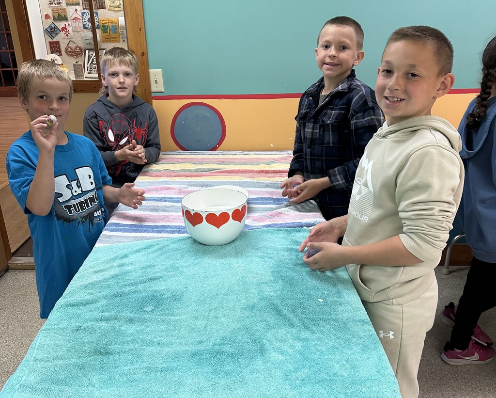 students make wool balls at Folklore