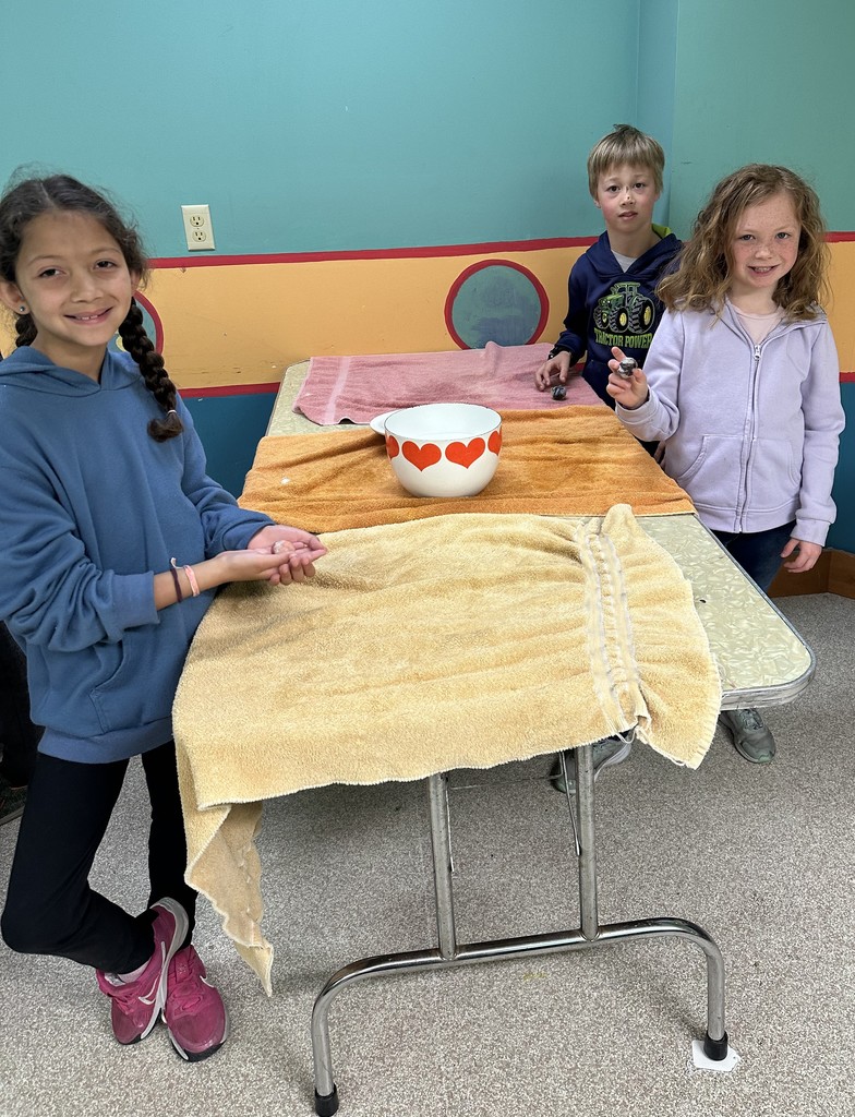 students make wool balls at Folklore