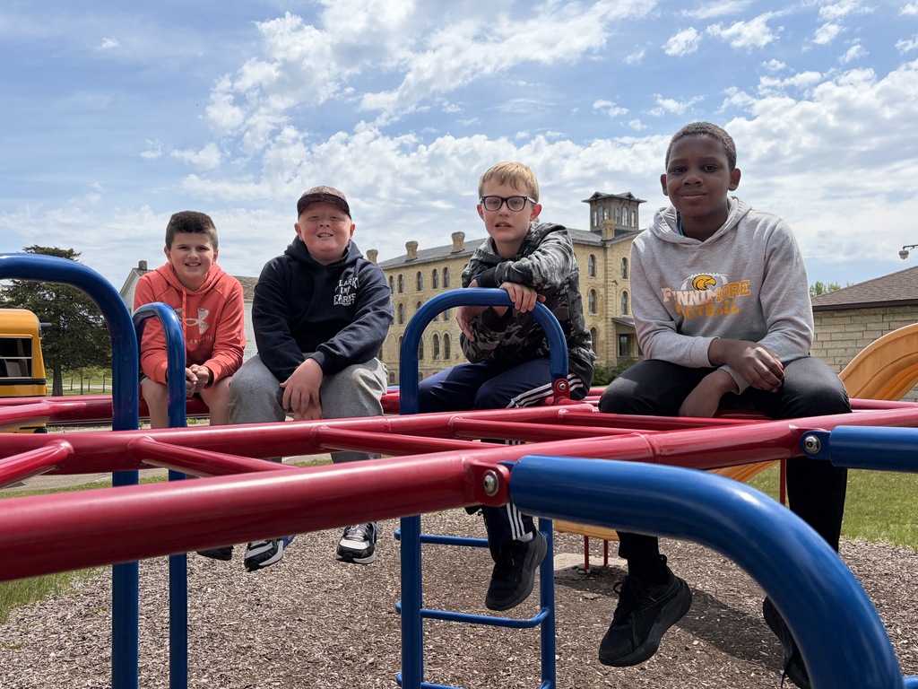 students play on playground on field trip