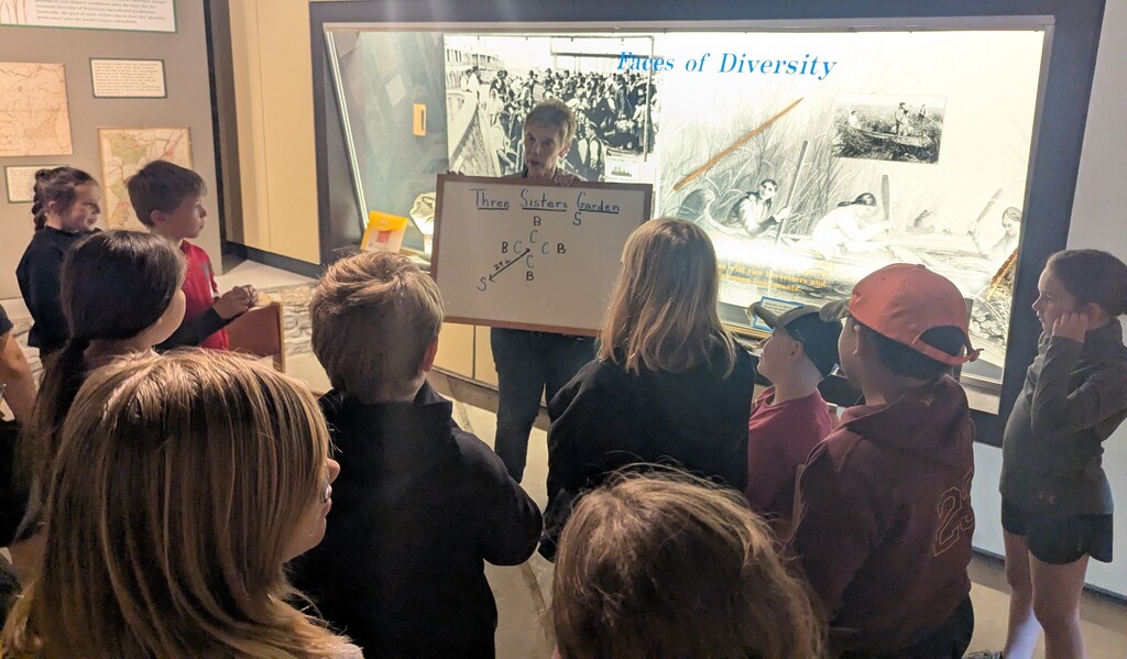 students listen to a presenter at Stonefield