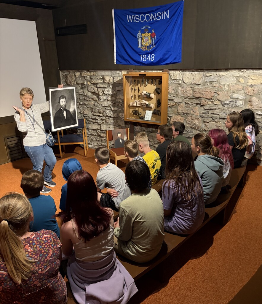 students listen to a presenter at Stonefield