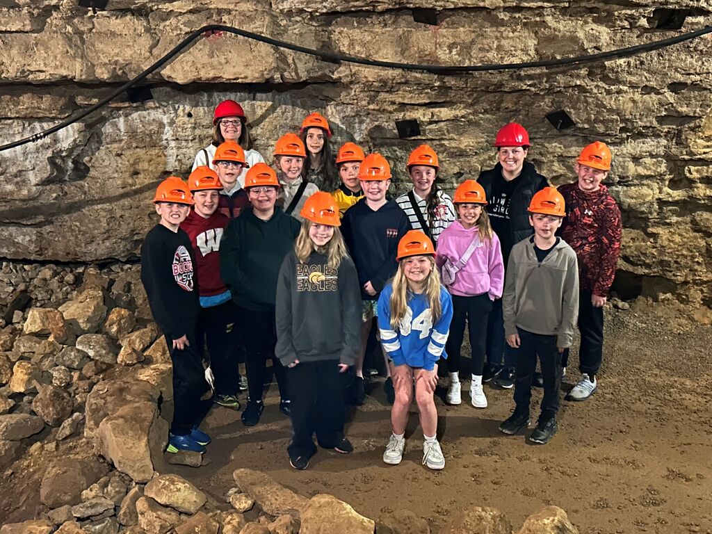 students wear hard hats at the Rollo Jamison Museum