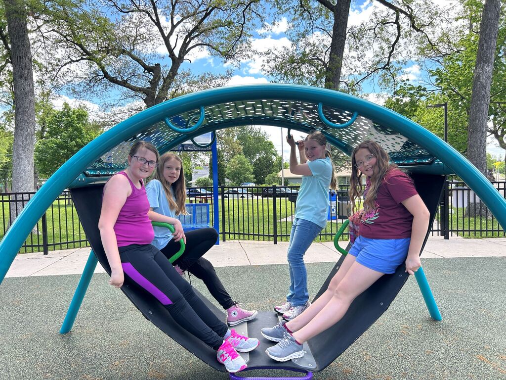 students play at the park