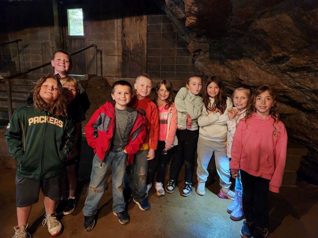students pose for a picture at Eagle Cave