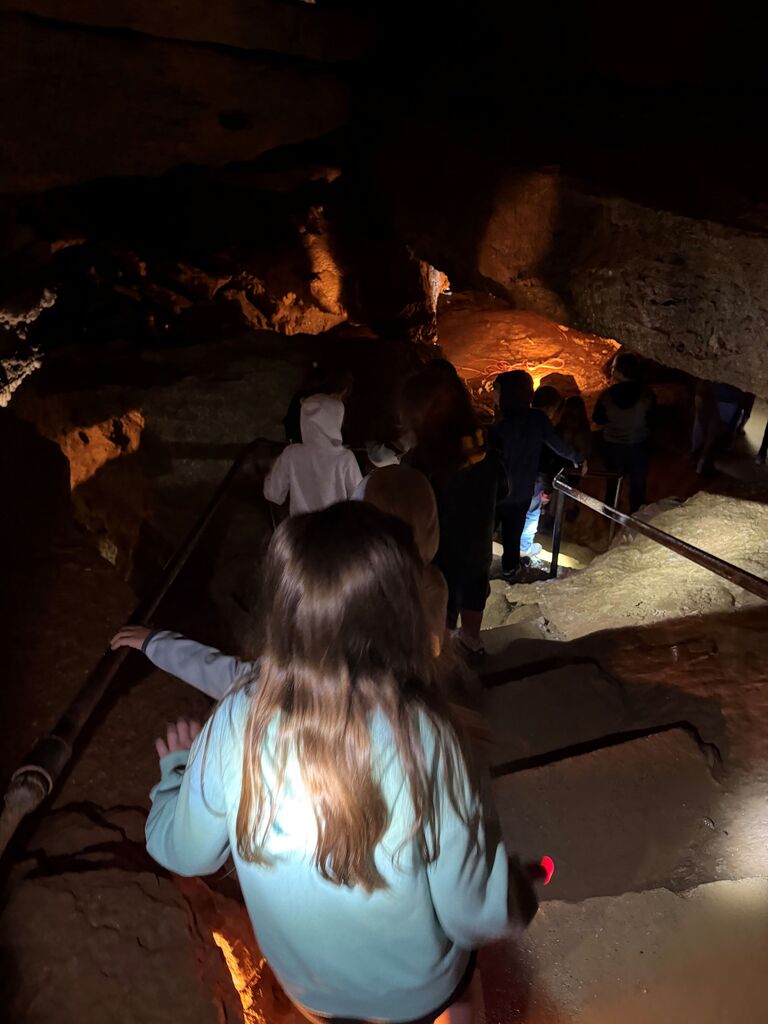 students explore Eagle Cave