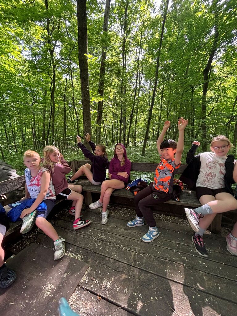 Students take a wagon ride at Eagle Cave