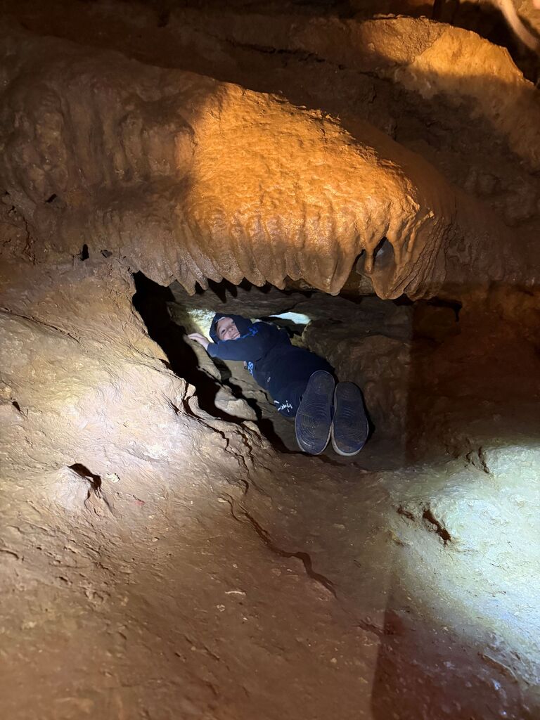 students explore Eagle Cave