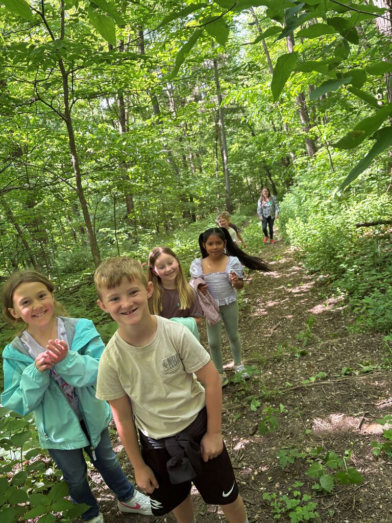 students take a hike at eagle cave