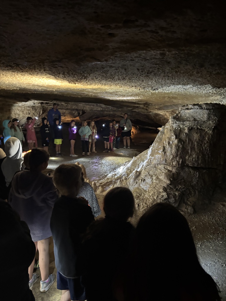 students explore Eagle Cave