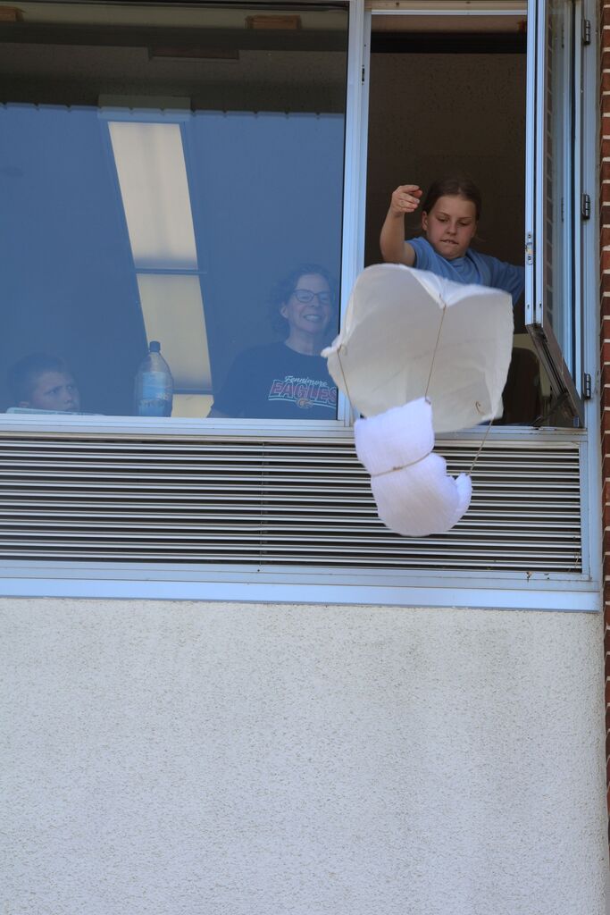 Student drops their contraption from 2nd floor of building