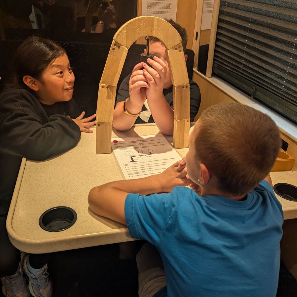 4th Grade students do STEM activities on the STEM shuttle