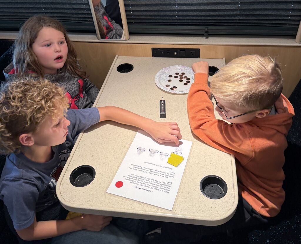 4th Grade students do STEM activities on the STEM shuttle