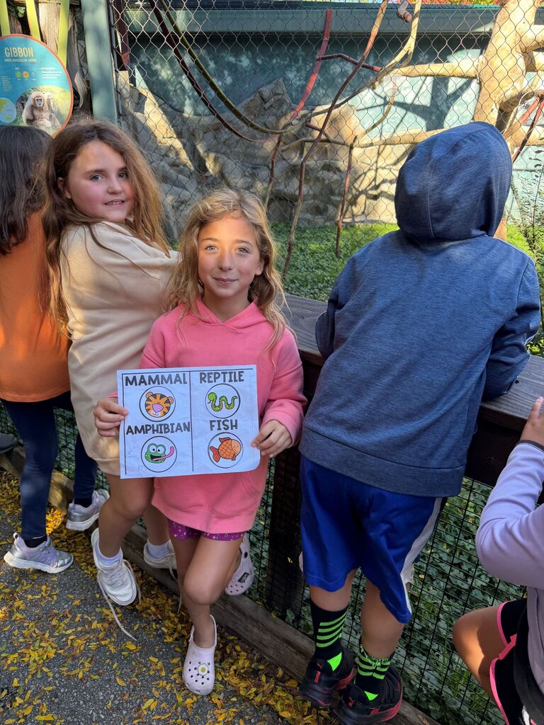 students pose for picture at the Henry Vilas Zoo