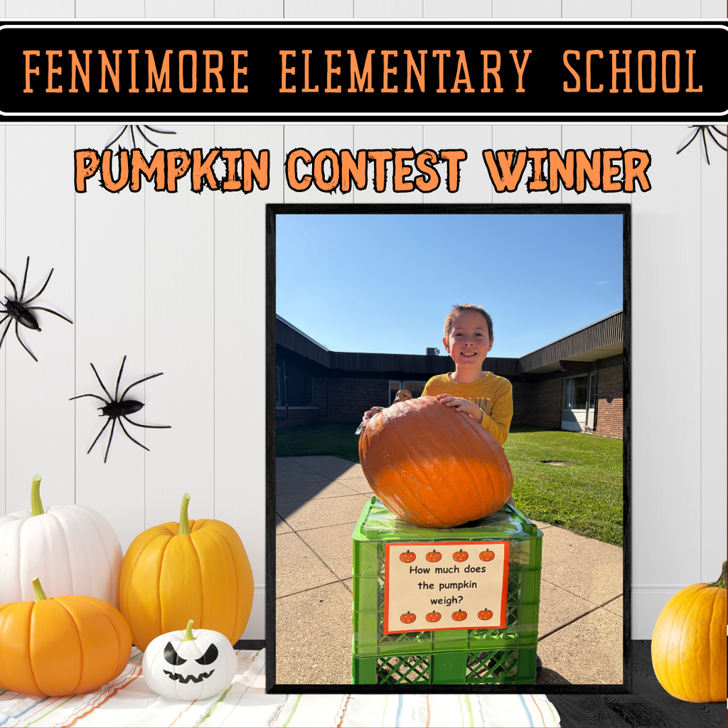pumpkin contest winner - Roman pictured with the pumpkin