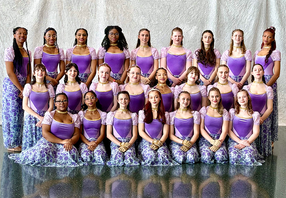 Winterguard poses for a team portrait