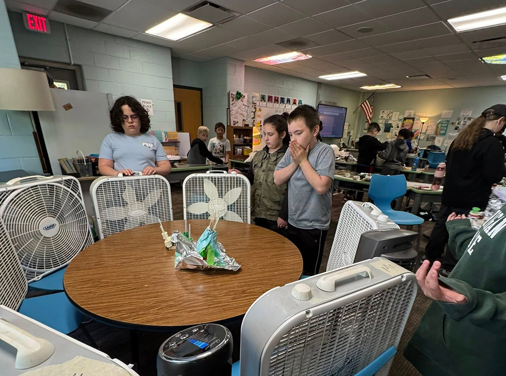 students explore safe construction models with a homemade wind tunnel