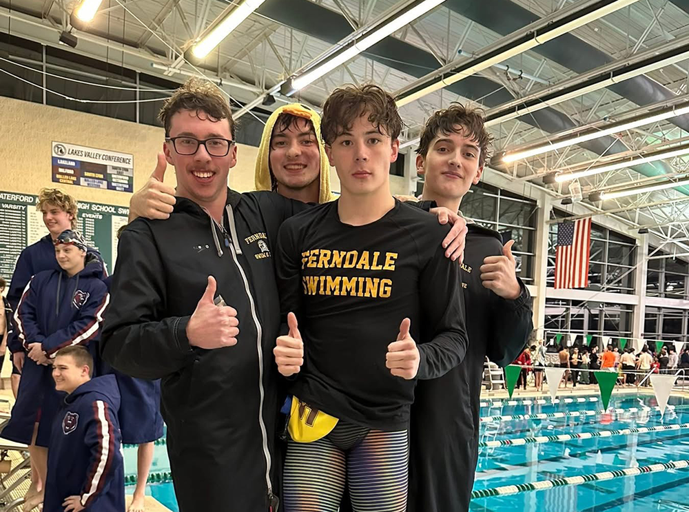 Swim Team celebrates a victory