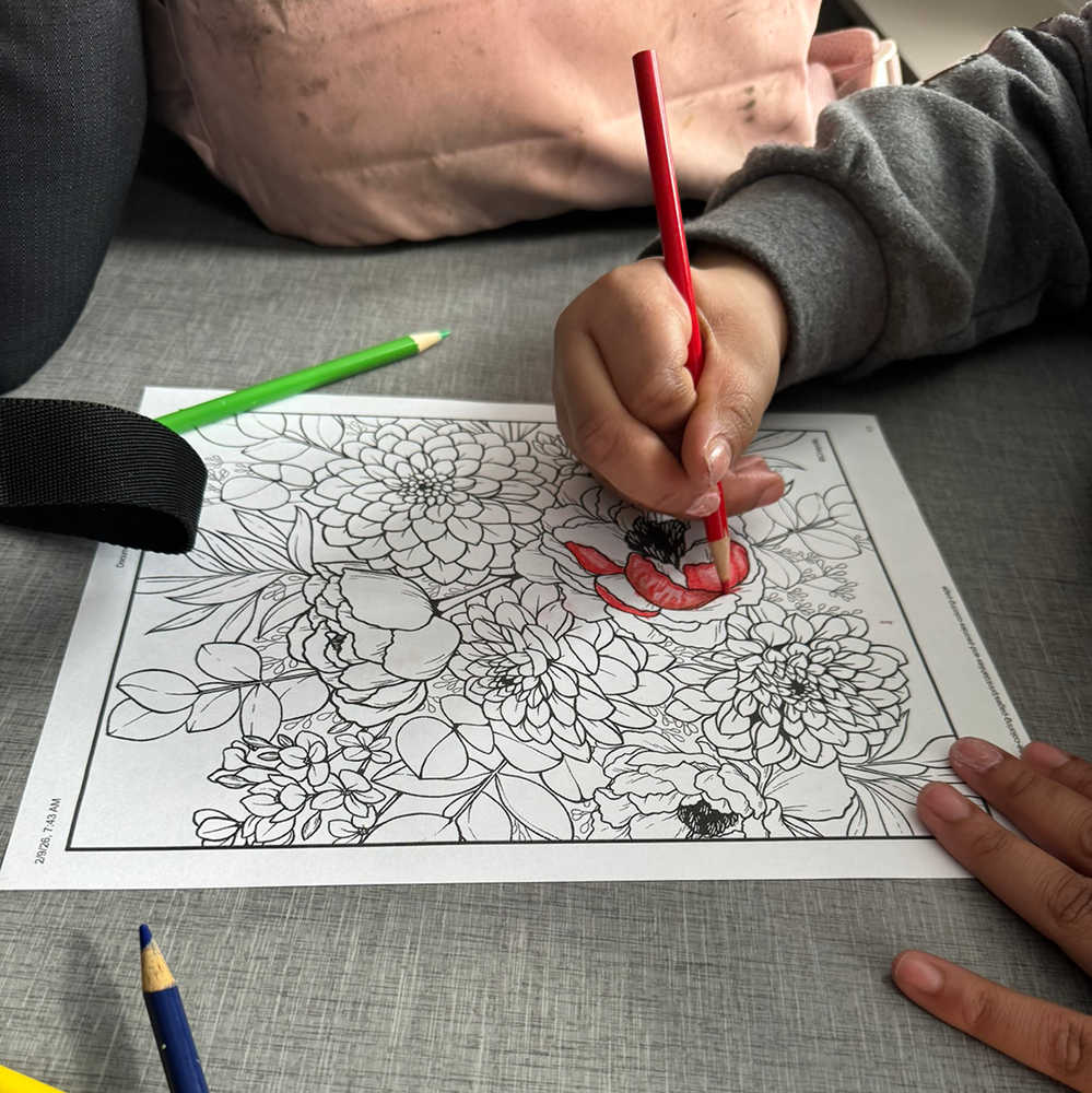 student colors during wellness day at UHS