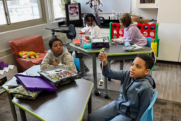 students explore STEM tools