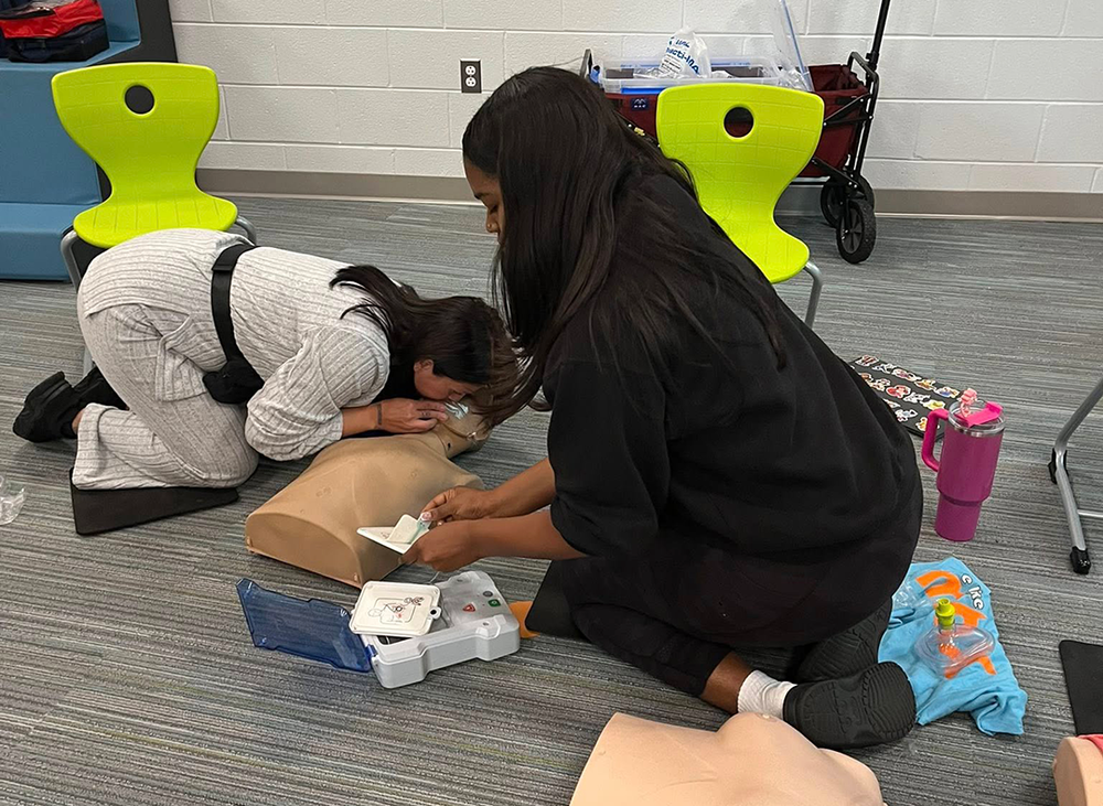 staff practices CPR techniques