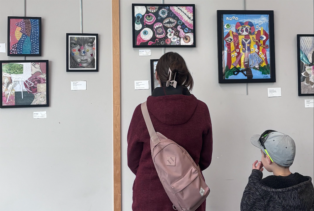 families view student art from UHS Art Club