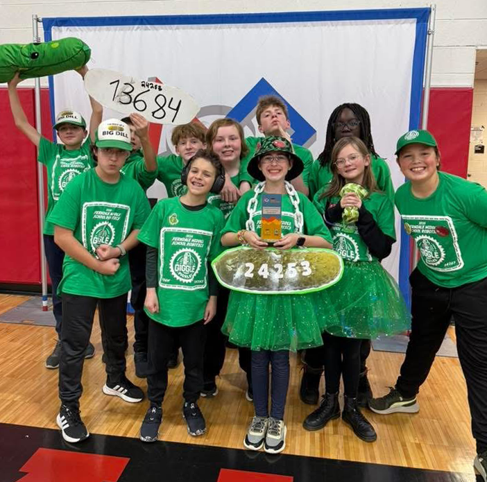 giggle pickles robotics team poses for a photo