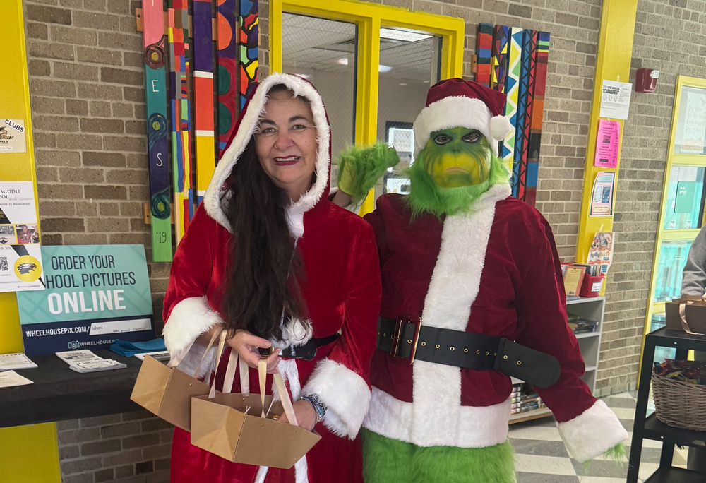 Mrs Clause and The Grinch visited FMS