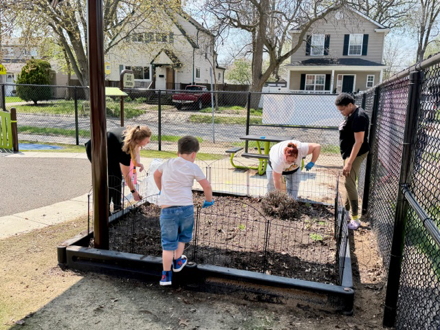 students and staff clean-up for Earth Week