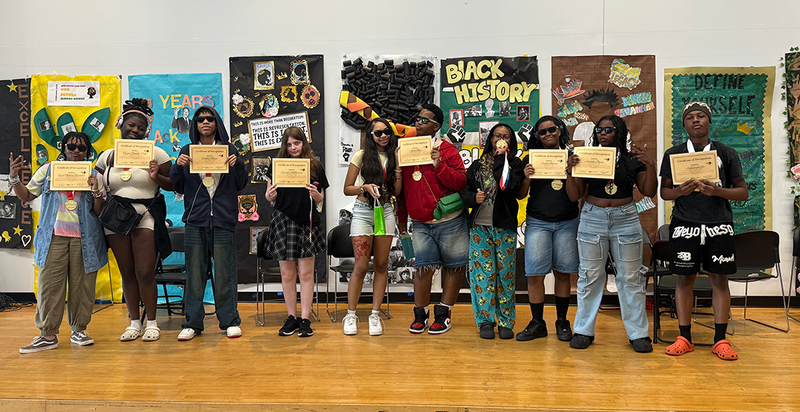 Pathway students show off their awards