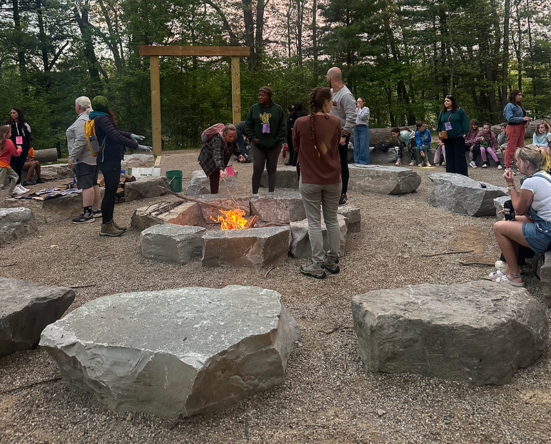 Ferndale students gather around the campfire at outdoor school