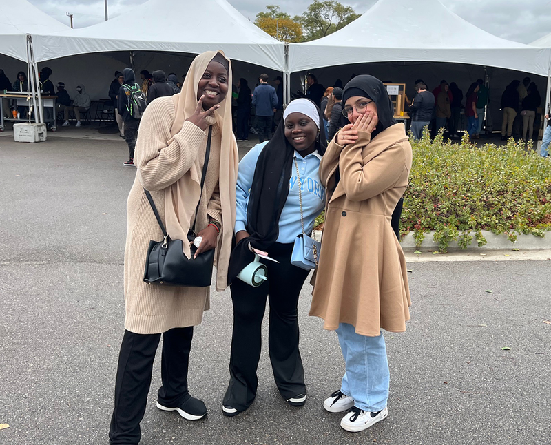 students smiling on a field trip