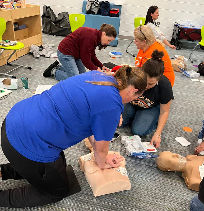 staff practices CPR techniques