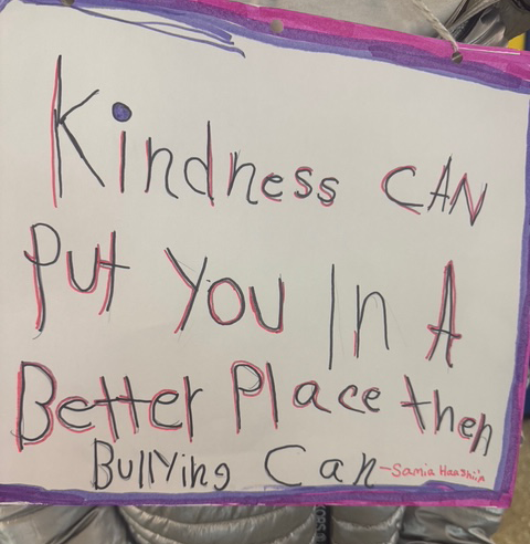 students made signs against bullying